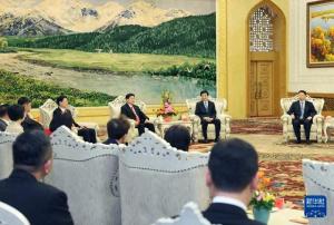 王沪宁会见国民党民代参访团，安排在了新疆厅丨湾区望海峡